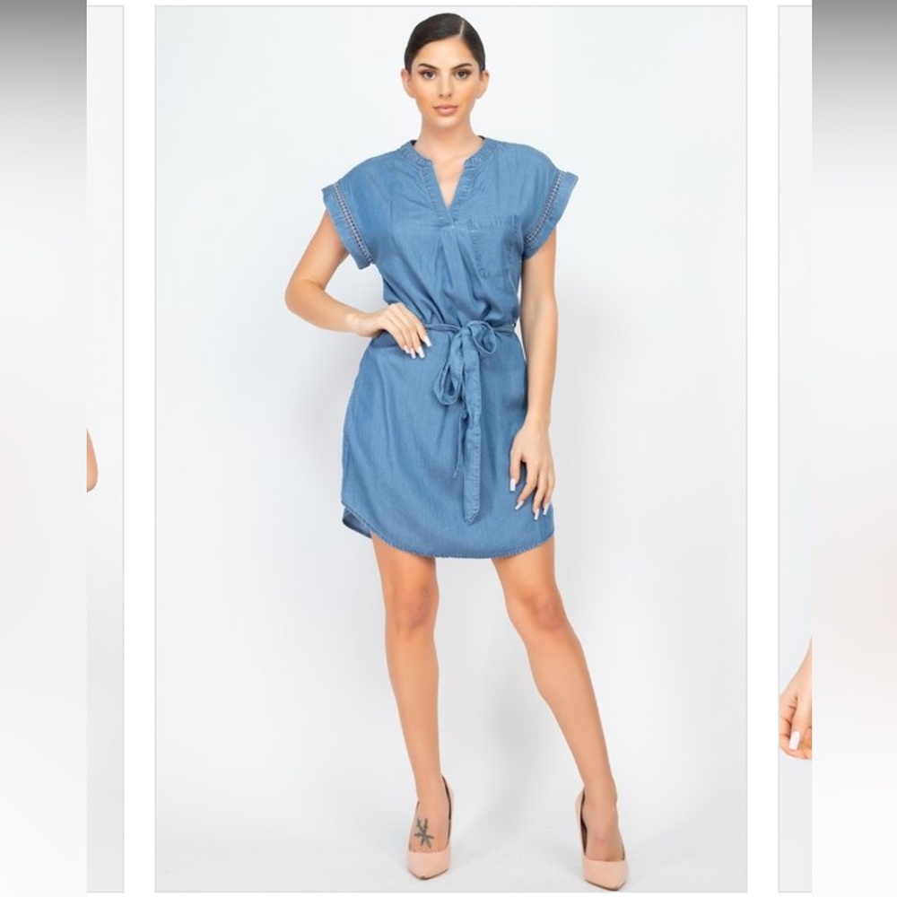A woven denim dress featuring a mid-thigh length dress🩵
